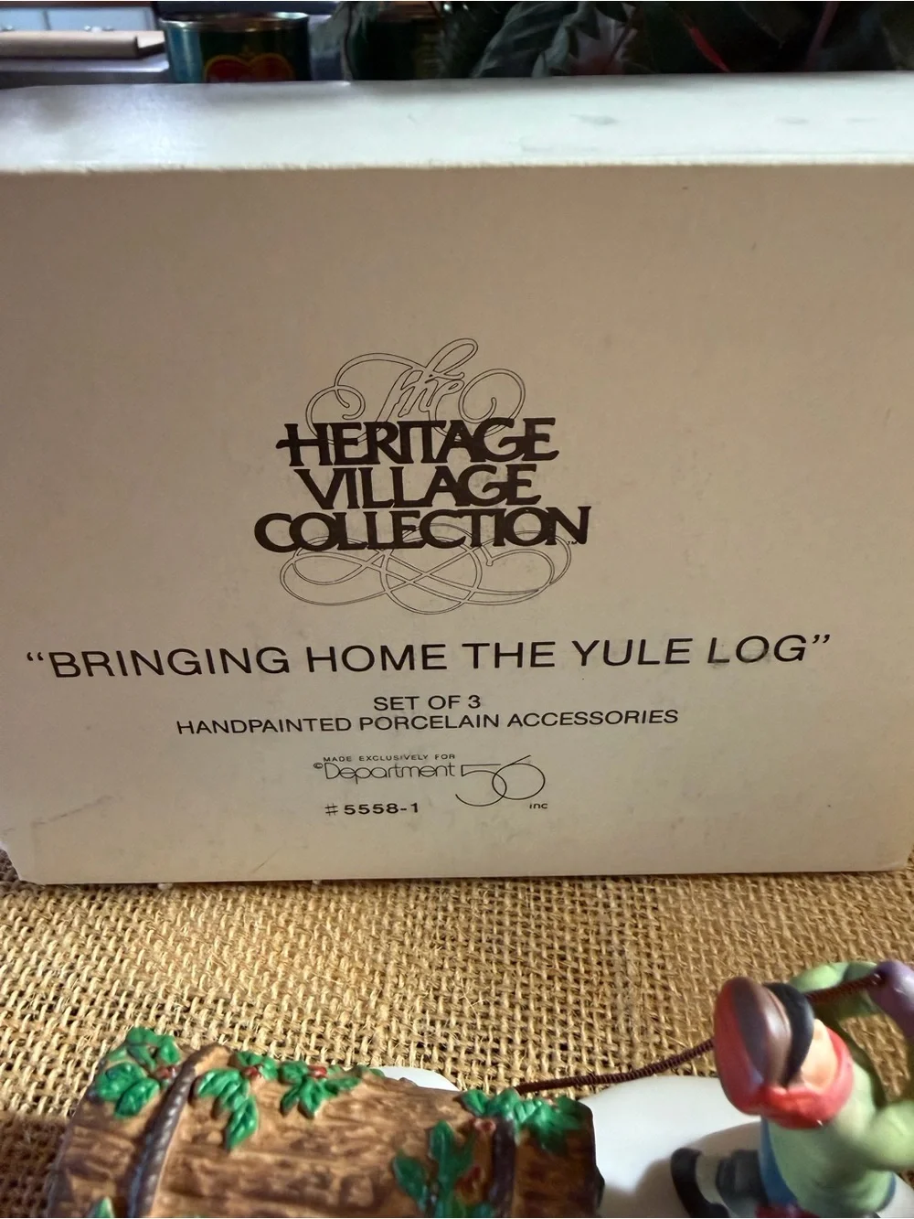 Department 56 Porcelain Carolers with Yule Log – Department 56